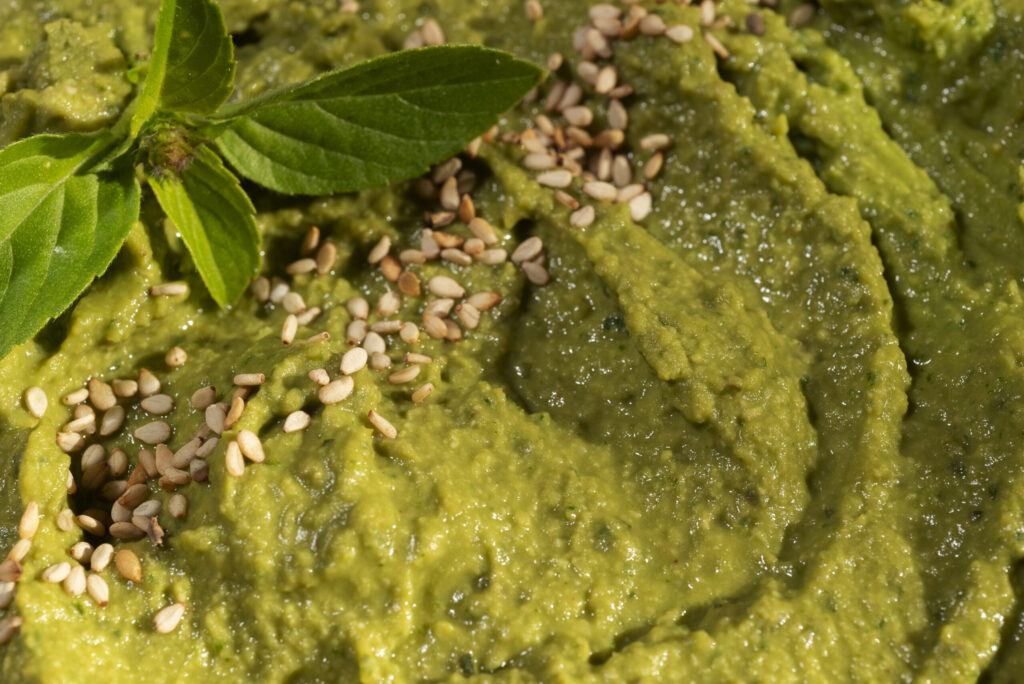Pistachio dessert paste with sesame seeds and mint.