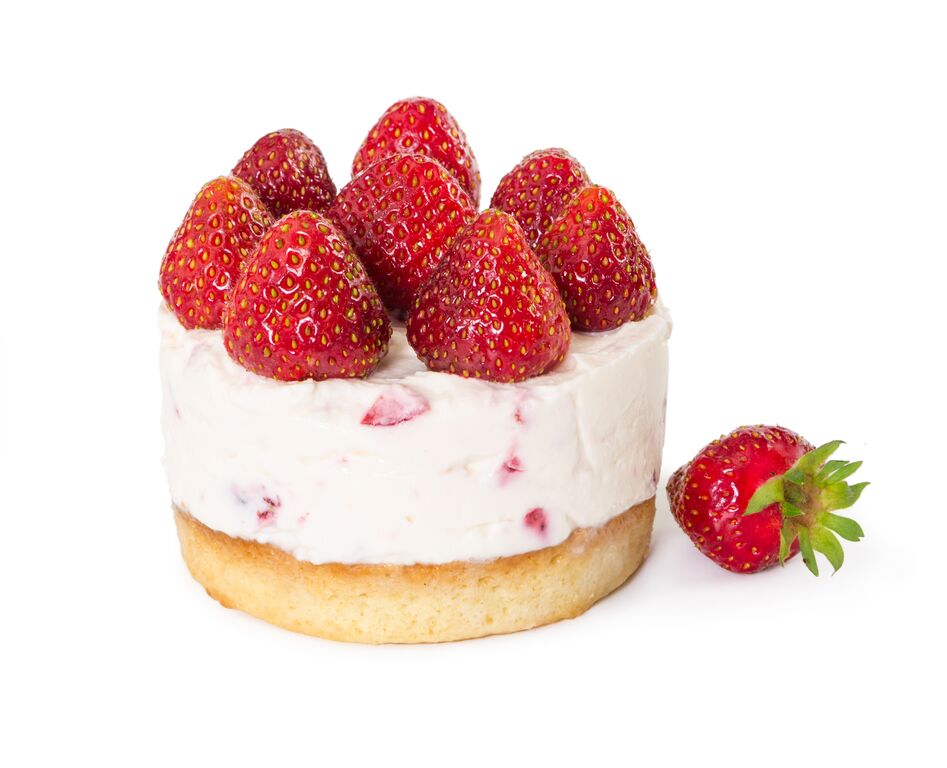 Strawberry cheesecake topped with fresh strawberries.