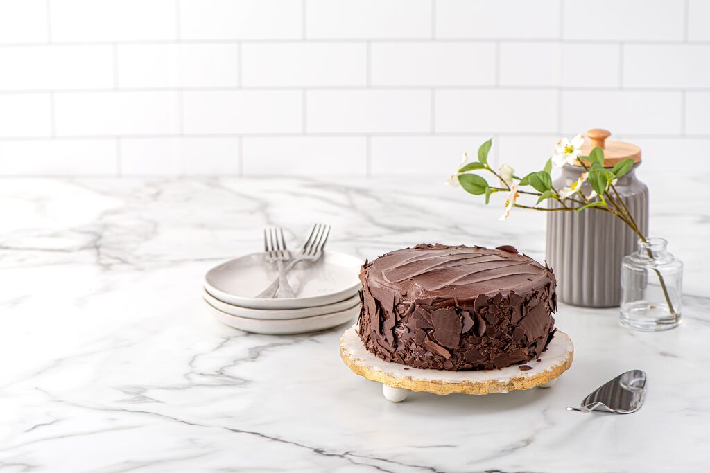 Chocolate cake with a rustic bark-textured ganache finish