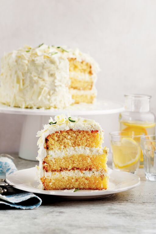 Layer cake with whipped cream frosting and lemon